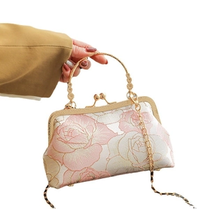 Pink cheongsam handbag with rose embroidery and metal chain strap for dinner parties