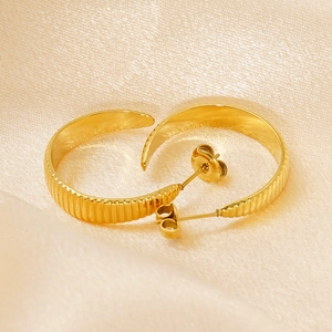 Geometric gold C-shaped stainless steel earrings with elegant vertical textured finish