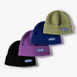 Thick ribbed knit beanies in multiple colors with embroidered Orderliness patch labels