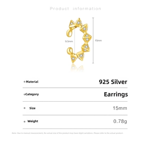 Macro detail of 925 silver gold ear cuff with white zircon showing 15mm size dimensions