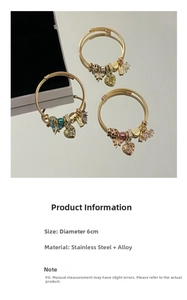 Detailed view of adjustable stainless steel charm bracelets with crystal heart pendants