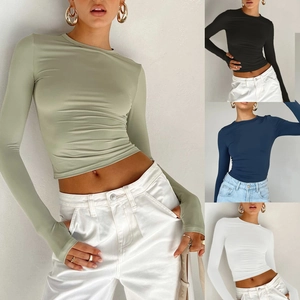 Slim fit long sleeve cropped T-shirt with thumbhole cuffs shown in multiple colors