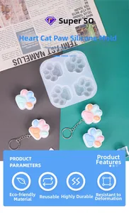 Macro shot of heart cat paw silicone resin mold with colorful candy-colored keychains