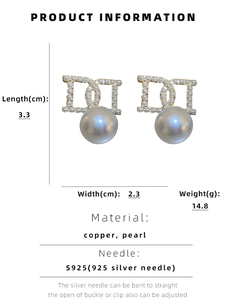 Detailed view of CD pearl earrings with S925 silver needles and 3.3cm x 2.3cm dimensions