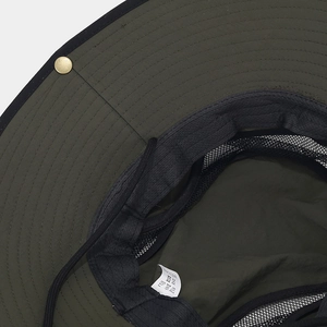 Detail of waterproof sun hat showing breathable mesh lining and adjustable wind cord