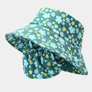 Detail view of floral outdoor sun hat featuring integrated face mask and neck protection
