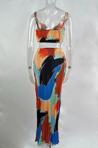 Macro detail of vibrant abstract oil painting print and fine plissé pleated fabric texture