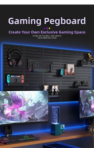 Detail of black modular pegboard showing gaming headset and controller storage with RGB light