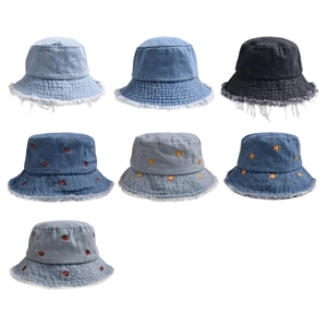 Denim bucket hats with embroidery and frayed edges in light blue and dark shades