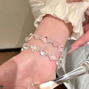 Chic beaded clover bracelets featuring pink and white crystals with silver pendants