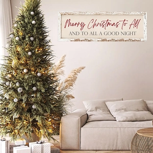 Detail view of wooden Merry Christmas wall sign plaque hanging in a warm home interior decor