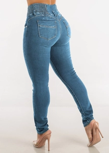 Detailed back view of high waist skinny jeans showing push-up effect and stretch denim fabric