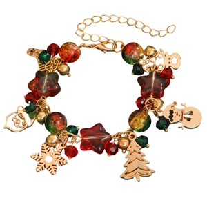 Christmas charm bracelet with red glass beads and snowflake santa tree pendants