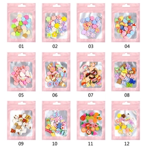Griglia di 12 ciondoli per nail art in resina mista in bustine rosa con numeri