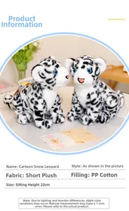 Detail of 22cm plush snow leopard toy with blue eyes and soft spotted fur fabric