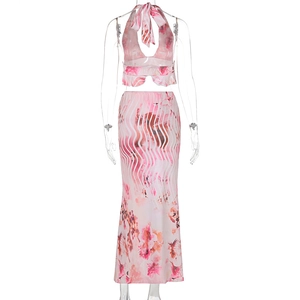 Detail view of the halter neck open-back top and maxi skirt set with floral print