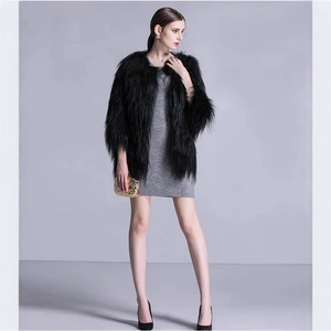 Chic women's black long faux fur coat with fluffy texture and stylish mid-length silhouette