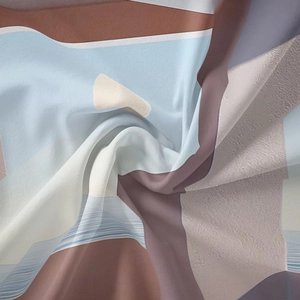 Macro shot of bohemian tapestry fabric showing smooth texture and geometric print patterns