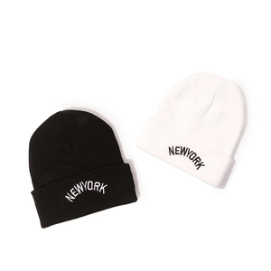 Winter knitted beanie hats in black and white with New York embroidery for men and women
