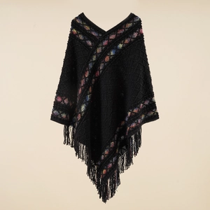 Women's ethnic knit poncho with V-neck, colorful diamond patterns and fringe hem