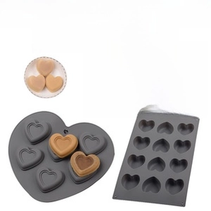 Macro shot of assorted heart-shaped silicone baking molds for cakes and chocolates