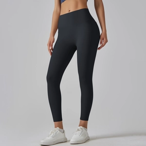 Detailed view of high waisted yoga pants with butt lift seams and matte finish
