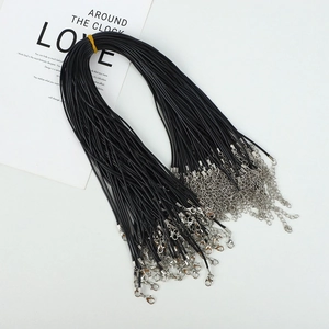 Detail of black wax necklace cords with silver lobster clasps and extension chains