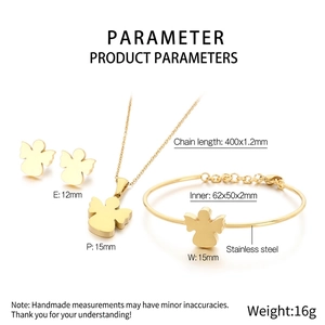 Detail view of gold stainless steel angel jewelry set including necklace and bracelet