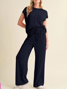 Women's dark blue ribbed knit two-piece set with short sleeve top and wide leg pants