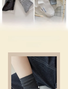 Detail of ribbed knit cotton socks in grey, white, and black with comfortable elastic cuffs