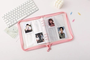 Detail of pink binder pocket pages for organizing photocards and K-pop collectibles