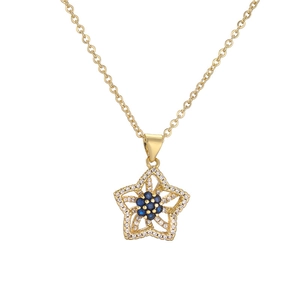 Gold plated flower pendant necklace with blue gemstone and zircon on white background