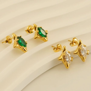 Stainless steel starburst earrings with 18k gold plating and emerald zircon stones
