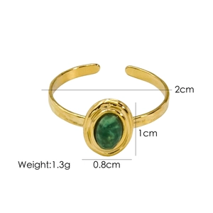 Detailed dimensions of gold open ring featuring an oval green gemstone weighing 1.3g