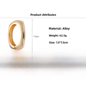 Polished gold wave metal bangle featuring dimensions of 7.5x7.5cm and 62.5g weight