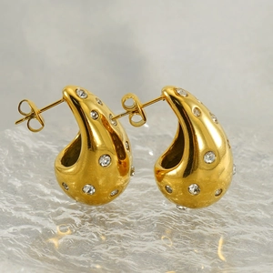 Polished hollow drop-shaped gold earrings with sparkling micro diamonds for women