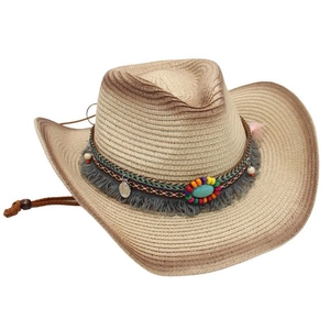 Detail of woven straw cowboy hat featuring bohemian beads, turquoise stone and grey tassels