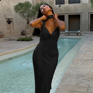 Elegant black satin halter neck long dress featuring a sleek open shoulder design for women