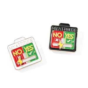 Detail view of high quality white and black enamel pins with My Attitude engraved text