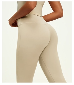 Detailed back view of high-waisted flared yoga pants showing butt-lifting seam construction