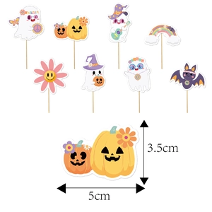 Bohemian Halloween cake toppers featuring hippie ghosts and pumpkins on wooden sticks