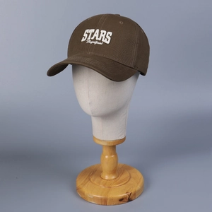 Brown baseball cap with white stars embroidery on a mannequin head, centered view