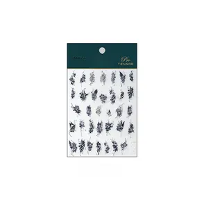 Detail view of TL-261 nail art stickers featuring black butterfly and floral patterns