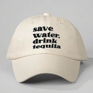 Close-up of save water drink tequila embroidery on beige cotton baseball cap