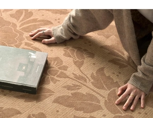 Detail shot of vintage floral pattern on water-resistant modern luxury area rug