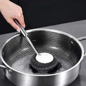 Durable stainless steel pot brush with long handle cleaning a honeycomb texture pan