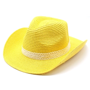 Close-up of bright yellow woven straw cowboy hat featuring an elegant white lace hatband