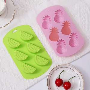 Silicone fruit shaped molds for ice, baking, and candles with watermelon and pineapple designs