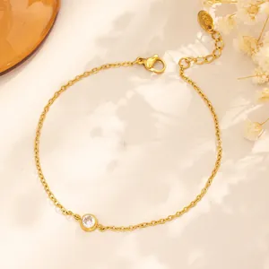 Elegant minimalist gold stainless steel bracelet with a sparkling round zircon centerpiece
