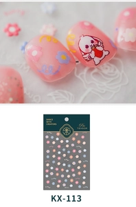 Macro detail of KX-113 floral nail stickers with cute rabbit and flower motifs